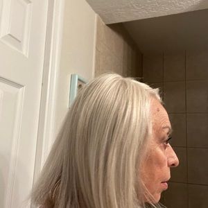 Great topper. Curly, natural look. Grey brown mix. Synthetic